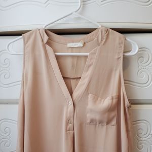 Sleeveless nude blouse
